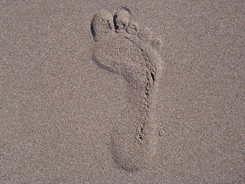 Fußabdruck im Sand