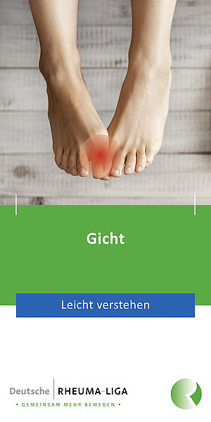 Füße mit rotem Punkt auf großem Zeh